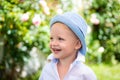 Happy child portrait. Adorable baby having fun. Beautiful fun day for cute little boy in nature. Happy little boy. Royalty Free Stock Photo