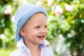 Happy child portrait. Adorable baby having fun. Beautiful fun day for cute little boy in nature. Happy little boy. Royalty Free Stock Photo