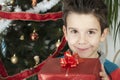 Happy child receive the gift of Christmas Royalty Free Stock Photo