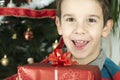 Happy child receive the gift of Christmas Royalty Free Stock Photo