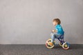 Happy child riding bike. Christmas holiday concept Royalty Free Stock Photo