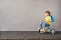 Happy child riding vintage trike