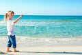 Happy child by the sea in the open air Royalty Free Stock Photo