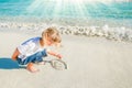 Happy child by the sea in the open air Royalty Free Stock Photo