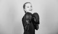 Happy child sportsman in boxing gloves. Fitness diet. energy health. workout of small girl boxer. punching knockout