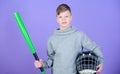 Happy child sportsman. Fitness diet brings health and energy. Gym workout of teen boy sportsman. Baseball bat and helmet Royalty Free Stock Photo