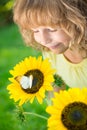 Happy child in spring park Royalty Free Stock Photo