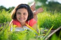 Happy child studying on nature