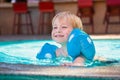 Happy child in the swimming-pool Royalty Free Stock Photo
