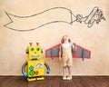 Happy child with toy robot Royalty Free Stock Photo