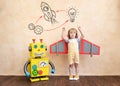 Happy child with toy robot Royalty Free Stock Photo