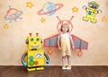 Happy child with toy robot Royalty Free Stock Photo