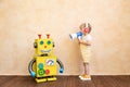 Happy child with toy robot Royalty Free Stock Photo