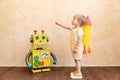 Happy child with toy robot Royalty Free Stock Photo