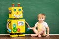 Happy child with toy robot Royalty Free Stock Photo
