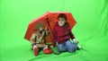 Happy child under the umbrella, green screen 4k ProRes, 4.2.2 10bit