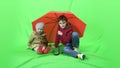 Happy child under the umbrella, green screen 4k ProRes, 4.2.2 10bit