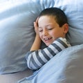 Happy child waking up Royalty Free Stock Photo