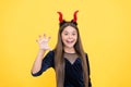 Happy child wear devil horns costume on halloween party, happy halloween fun