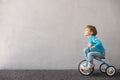 Happy child riding bike. Christmas holiday concept Royalty Free Stock Photo