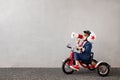 Happy child wearing suit riding vintage bicycle Royalty Free Stock Photo