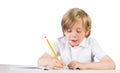 Happy child writing down homework Royalty Free Stock Photo