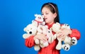 Happy childhood. Birthday. hugging a teddy bear. little girl playing game in playroom. toys for kid. small girl with Royalty Free Stock Photo