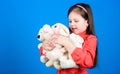 Happy childhood. Birthday. hugging a teddy bear. small girl with soft bear toy. Childrens room. toy shop. childrens day Royalty Free Stock Photo