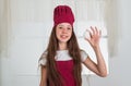 happy childhood. happy child wear cook uniform. chef girl in hat and apron. kid cooking food in kitchen. choosing a Royalty Free Stock Photo