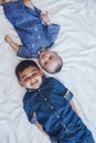 Happy childhood concept. Happy brothers portrait. 6 years boy and 6 months old baby boy having fun. Two little kids smiling to the Royalty Free Stock Photo