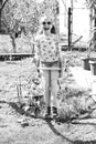 Happy childhood concept. Little child smile on swing in summer yard. Fashion girl in sunglasses enjoy swinging on sunny