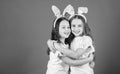 Happy childhood. Friendship concept. Easter vibes. Happy easter. Holiday bunny girls with long bunny ears hug. Children Royalty Free Stock Photo