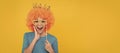 happy childhood. girls birthday party. happy funny kid in curly wig and crown. Funny teenager child in wig, party poster Royalty Free Stock Photo