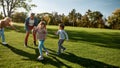 Happy childhood memories. Excited family running outdoors on a sunny day Royalty Free Stock Photo