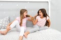 Happy childhood moments. Kids girls sisters best friends full of energy in cheerful mood. Grow strong and healthy hair