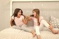 Happy childhood moments. Kids girls sisters best friends full of energy in cheerful mood. Grow strong and healthy hair