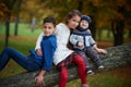 Happy children in autumn park Royalty Free Stock Photo