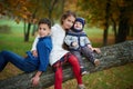 Happy children in autumn park Royalty Free Stock Photo