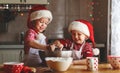 Happy children bake christmas cookies Royalty Free Stock Photo