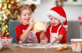 Happy children bake christmas cookies Royalty Free Stock Photo