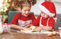 Happy children bake christmas cookies Royalty Free Stock Photo