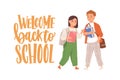 Happy children with books and bags and Welcome Back to School lettering. Junior schoolkids smiling. Girl and boy with Royalty Free Stock Photo