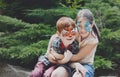 Happy children, boy and girl with face paint in park Royalty Free Stock Photo