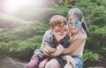 Happy children, boy and girl with face paint in park Royalty Free Stock Photo