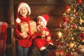 Happy children brother and sister with Christmas present