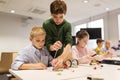 Happy children building robots at robotics school Royalty Free Stock Photo