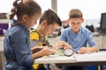 Happy children building robots at robotics school Royalty Free Stock Photo