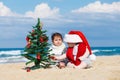 Happy children playing on the beach Royalty Free Stock Photo