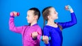 Happy children coach with barbell. Fitness diet for energy health. workout of small girls hold dumbbell. weight lifting