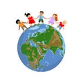 Happy children of different races and colors holding hands and standing on the globe Royalty Free Stock Photo